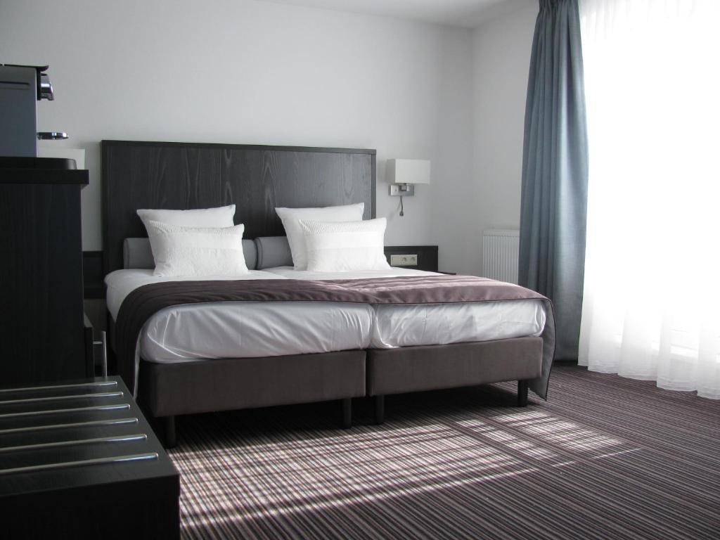 Boutique Hotel De Zwaluw De Koog  Habitación foto
